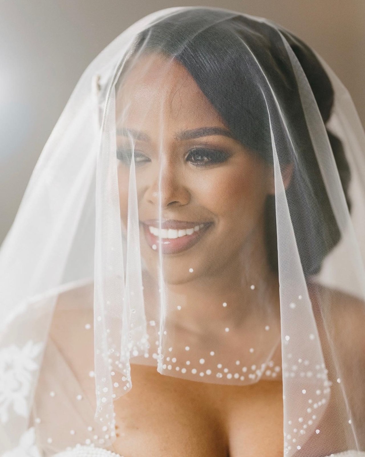 Bride in veil close-up — bridal makeup by Sia Mia