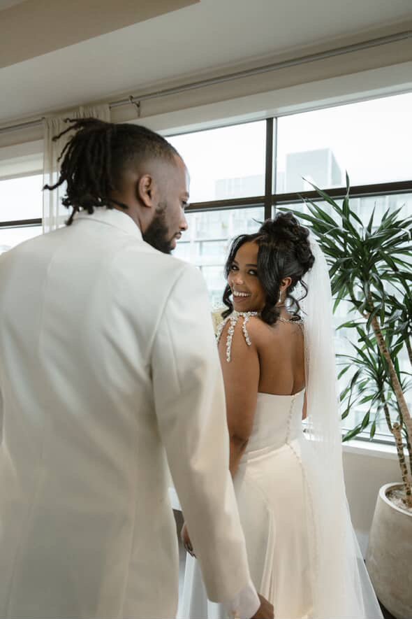 Bride's first look — bridal makeup by Sia Mia