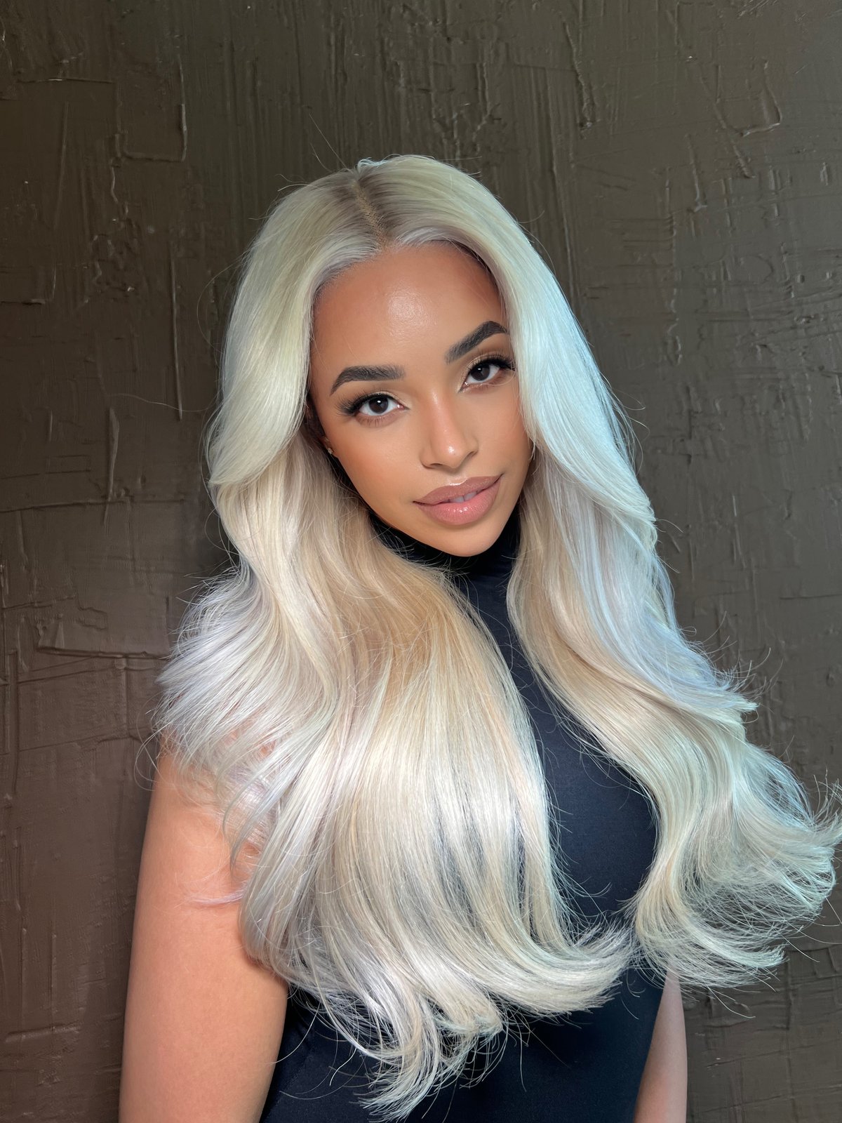 Platinum blonde glam — hair and makeup by Sia Mia