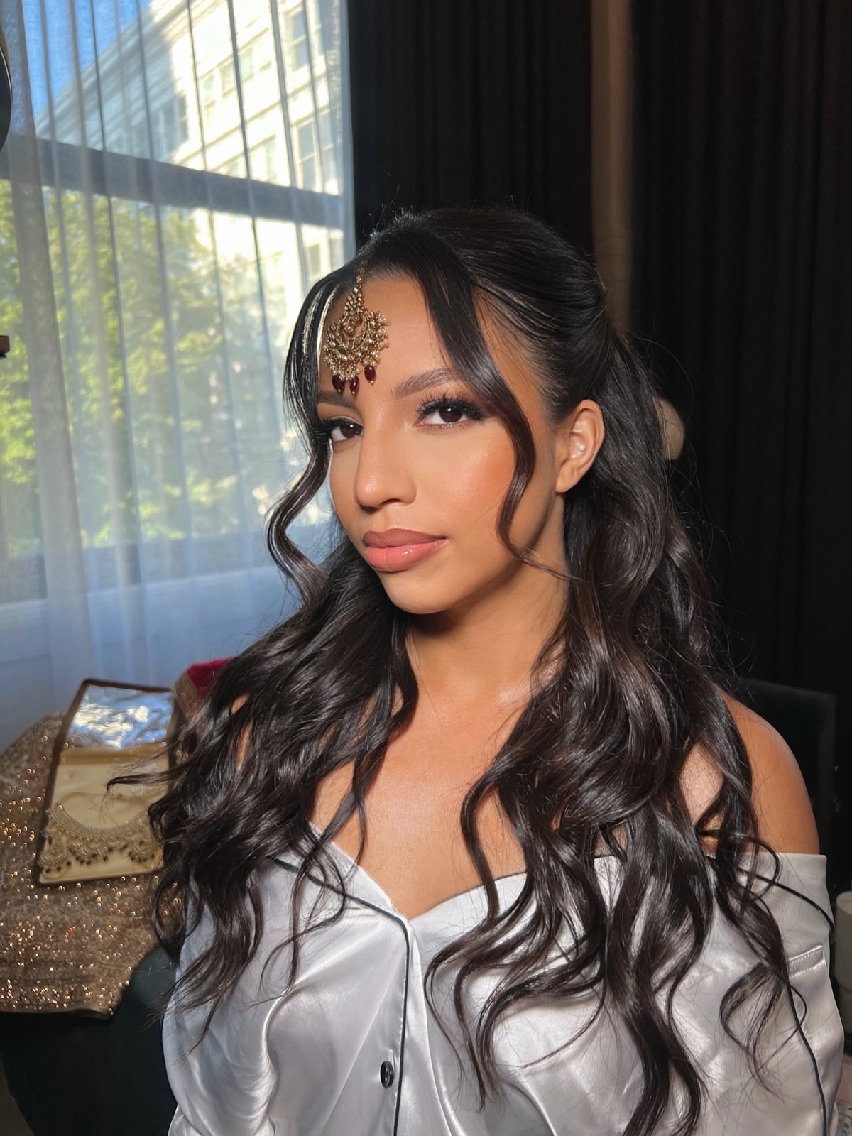 Soft glam with maang tikka — makeup and hair by Sia Mia